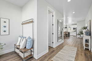 Hallway featuring dark hardwood / wood-style flooring