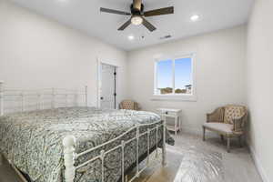 Bedroom featuring carpet flooring and ceiling fan