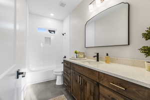 Full bathroom with vanity, tile patterned flooring, tiled shower / bath