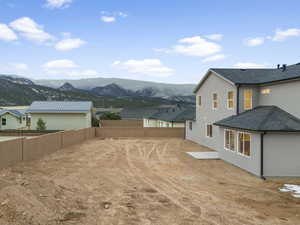View of backyard with a mountain view