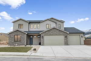 View of front of home featuring a 3-car garage