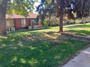 View of yard featuring central air condition unit