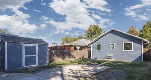 View Of Large Backyard Featuring Parking Pad For 2-3 Cars & Newer 10x12 Shed. Plenty Of Yard For Entertaining!