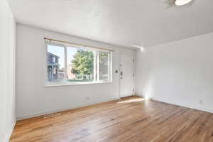 Living Room: light hardwood / wood flooring