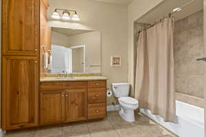 Full Bathroom with 2 Separate Entrances. 1 from Bedroom 2, 1 from Hall by Dining Room