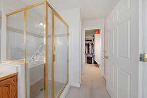 Master Bathroom with an enclosed shower, vanity and master closet.