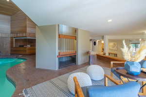 Living room featuring vaulted ceiling