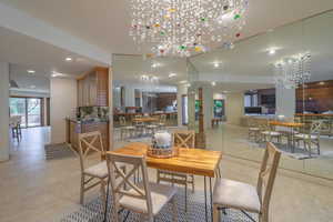 Dining space featuring an inviting chandelier