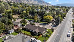 Birds eye view of property with a mountain view