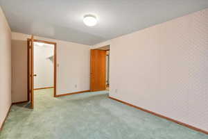 Empty room with light carpet