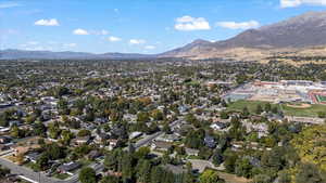 Birds eye view of property featuring a mountain view