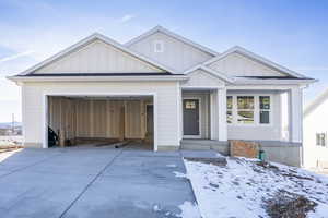 View of front of house with a garage