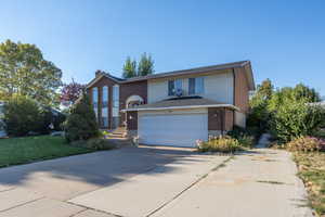 View of front of property with a garage