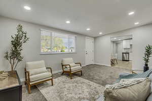 Living room with light colored carpet