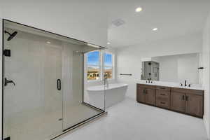 Bathroom with vanity and plus walk in shower