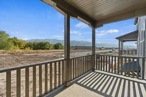 Balcony featuring a mountain view