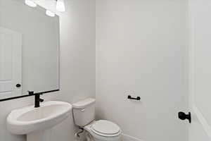 Bathroom with toilet and sink