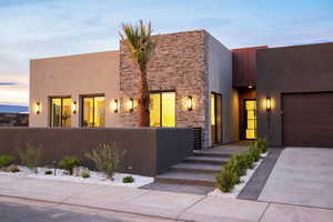 View of front of property with a garage