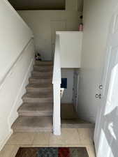 Stairway with tile patterned floors