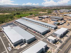 Birds eye view of property with a mountain view