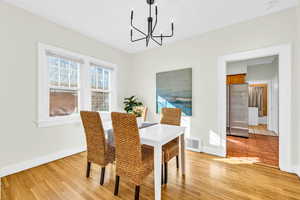 Unit 1415 Features hardwood floors and new light fixtures. Could also be used as an office.