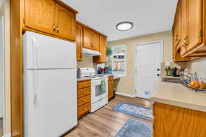 Unit 1417 Features newer flooring and light fixtures