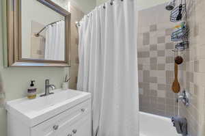 Unit 1417 Features a newer vanity, mirror, and light fixtures