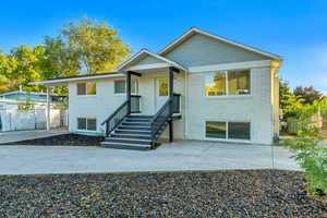 View of front of property with a patio