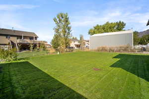 View of yard featuring a deck