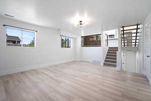 Interior space with light hardwood / wood-style flooring