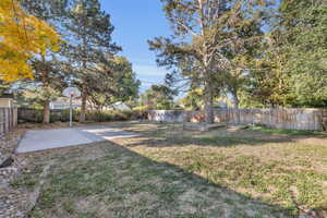 View of yard featuring basketball court