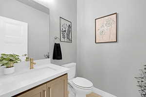 Bathroom with vanity and toilet