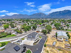 Birds eye view of property with a mountain view