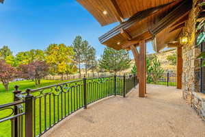 View of patio featuring a rural view and a balcony