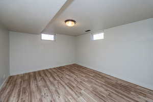 Bedroom 3 with light LVP flooring