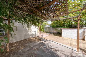 View of patio with a pergola