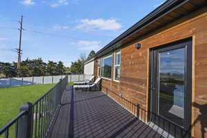 Wooden terrace with a yard