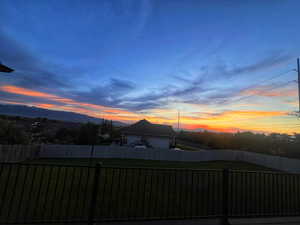 View of yard at dusk