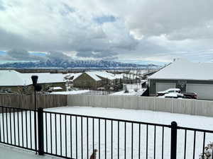 Exterior space featuring a mountain view and a garage