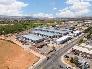 Birds eye view of property with a mountain view