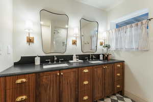 Bathroom with walk in shower and vanity