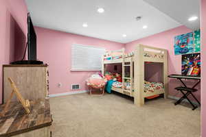 Bedroom featuring carpet