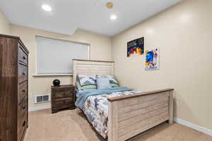 Bedroom featuring carpet