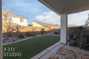 View of yard with a patio