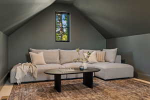 Living room with vaulted ceiling