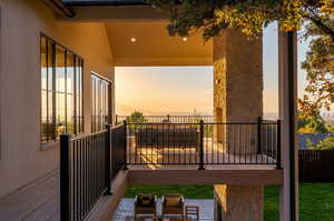 View of balcony at dusk