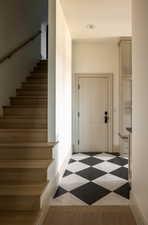 Staircase with wood-type flooring