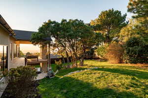 View of yard featuring a wooden deck