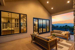 Exterior space featuring an outdoor living space and a mountain view