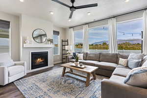 Living Room with Gas Fireplace, recessed lighting throughout, and abundant natural light.